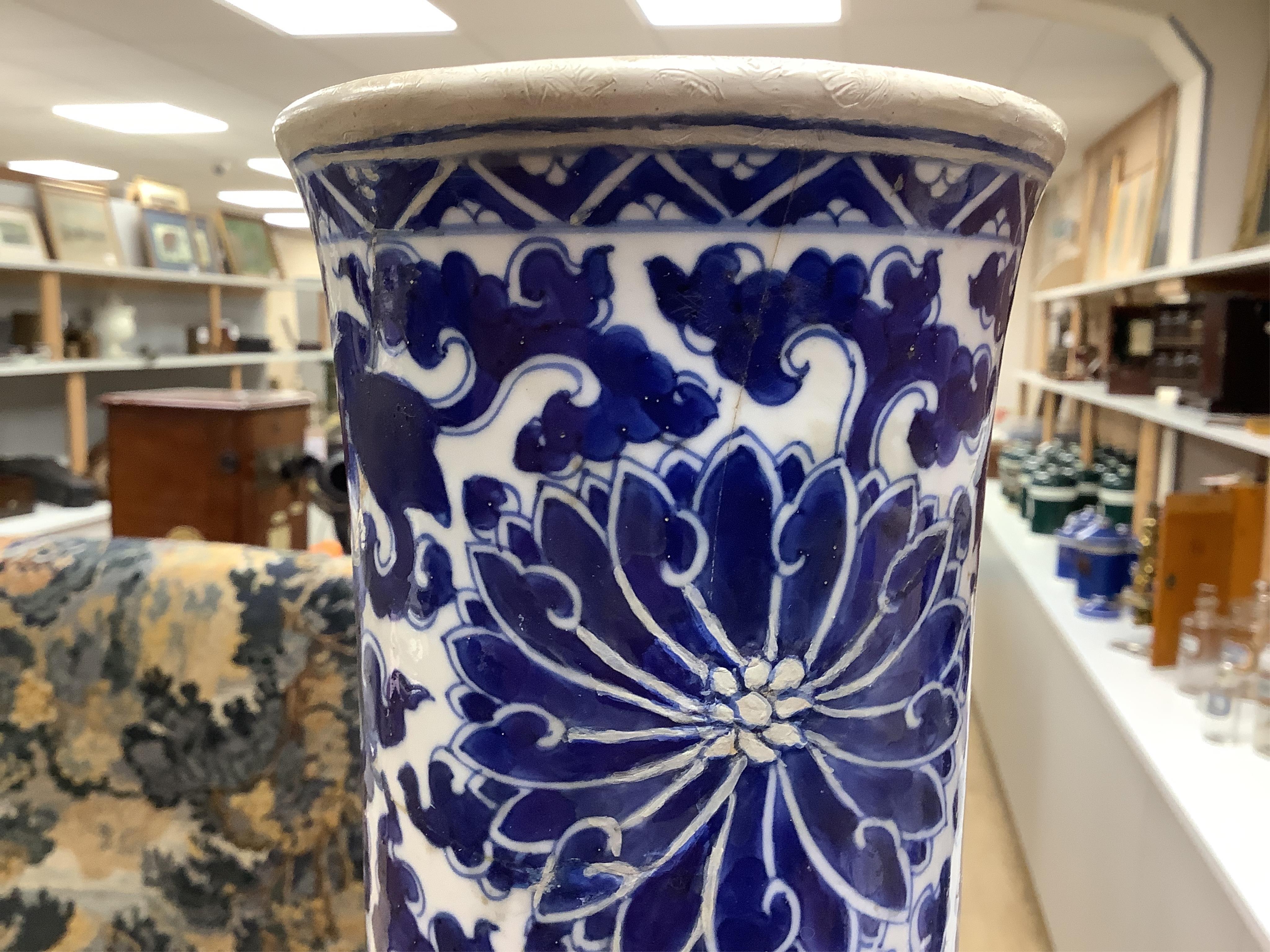 A Chinese blue and white bottle vase with lotus decoration, restored, Kangxi Period, 44cm high